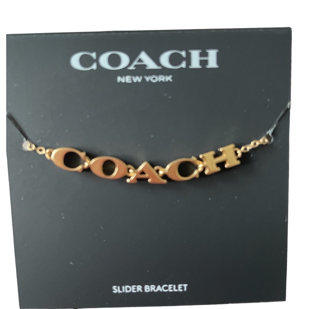 Brand new with tag Coach brand Bolo adjustable gold tone bracelet